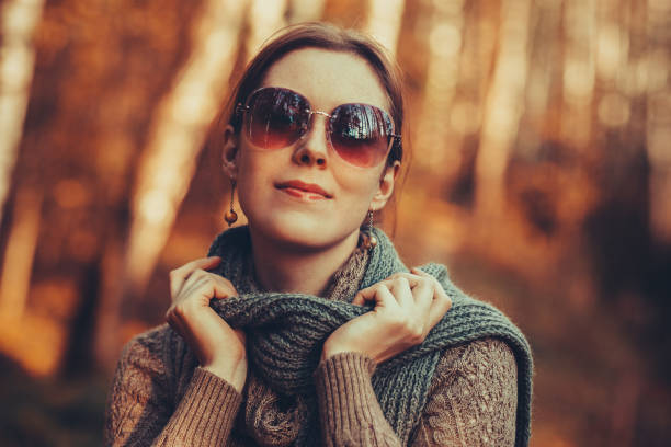 istock Woman autumn portrait 995687672