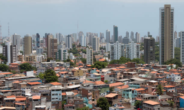 istock Favela and buildings - Urban social contrast 995728202