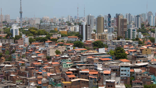 istock Favela and buildings - Urban social contrast 995728306