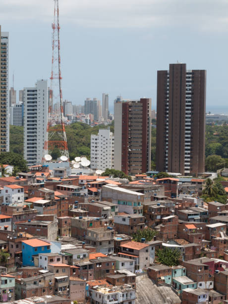 istock Favela and buildings - Urban social contrast 995728338
