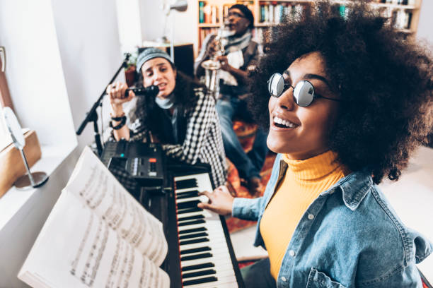 istock Band playing and singing at home 995744866