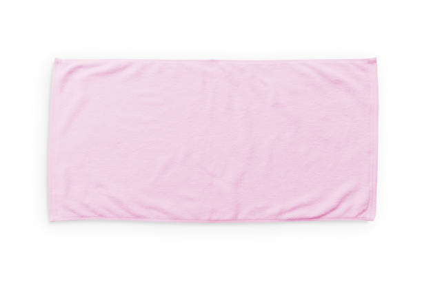 istock Pink beach towel mock up isolated on white background, flat lay top view 995745200