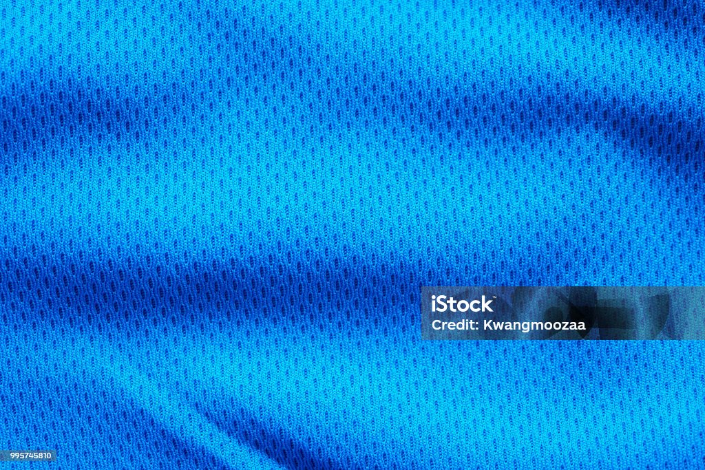 Fundo de textura de malha de tecido azul esporte vestuário futebol jersey com ar - Foto de stock de Texturizado - Descrição Geral royalty-free