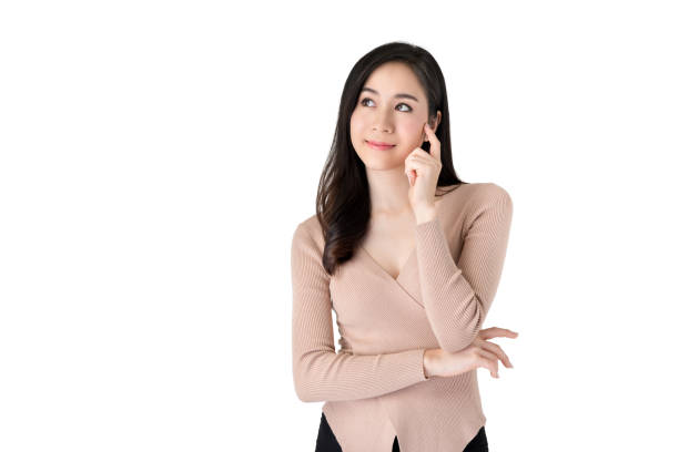 Young beautiful pensive Asian woman
