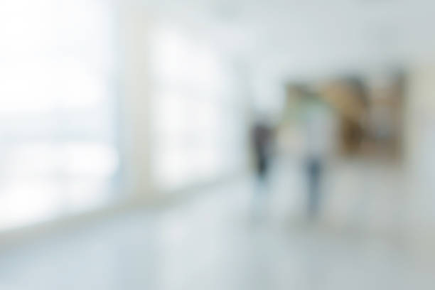 istock blur image background of corridor office hospital walkway 995779442