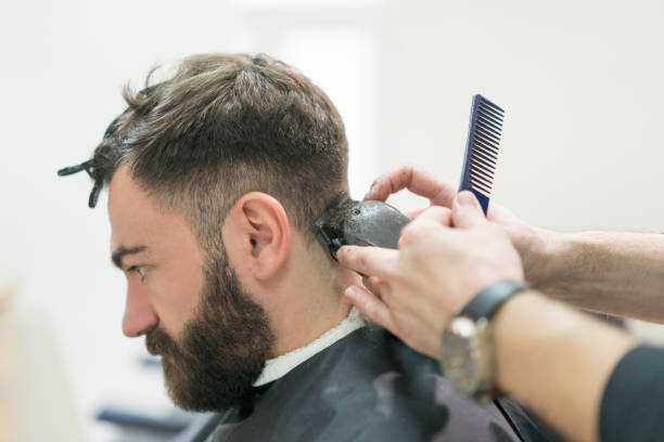 istock Hipster having a haircut 995791272
