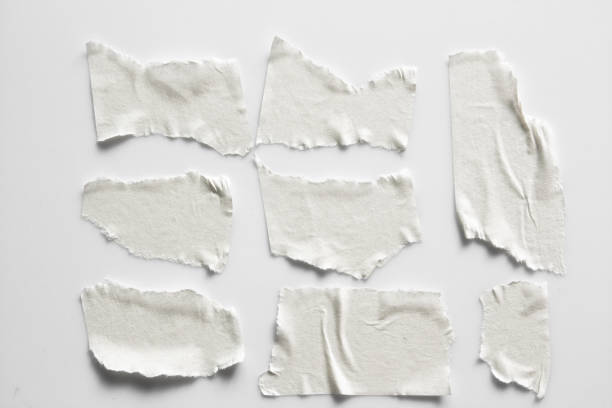 istock Set of white tapes on gray background. Torn horizontal and different size white sticky tape, adhesive pieces. 995794568