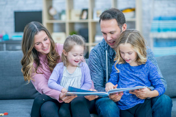 istock Family reading together 995799638