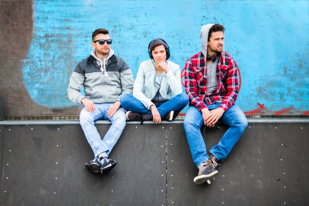 istock Friends relaxing in a skate park 995808592