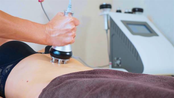 istock Hardware figure correction. Machine cosmetology. Anti-cellulite massage. 995880858