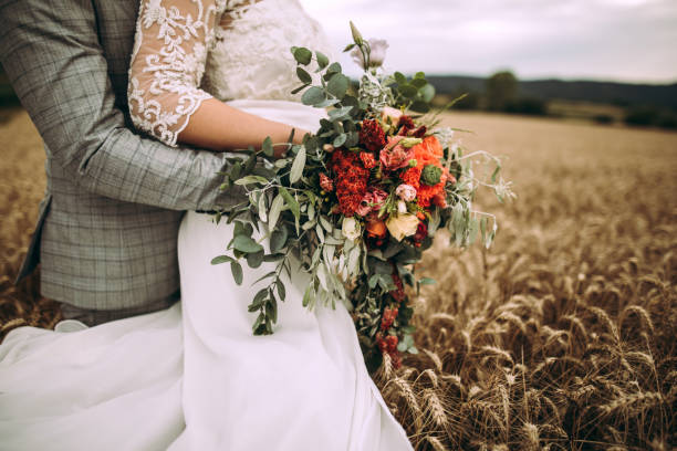 istock Married Couple On Wheat Field 995899054