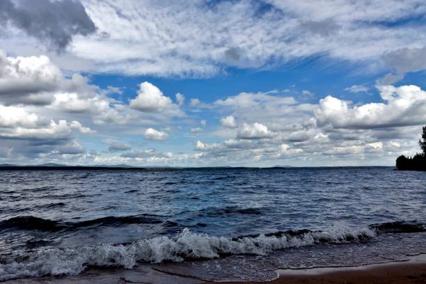 istock dark gray sky over the restless lake 995904074