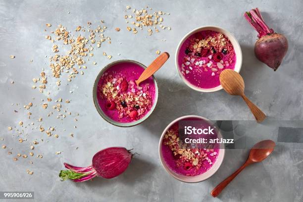Healthy Breakfast Bowl With Beetroot Oat Flakes And Berry On Stone Background Flat Lay Stock Photo - Download Image Now