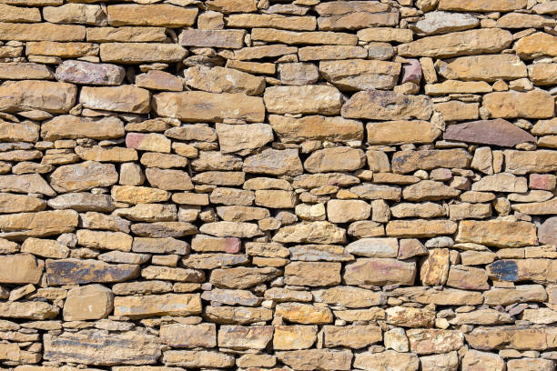 istock Background of old stone wall texture 995915760