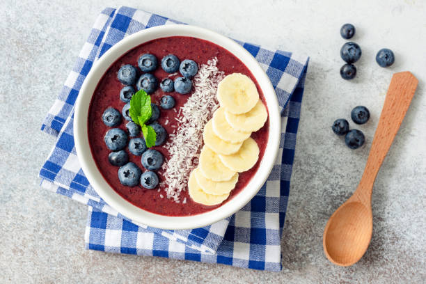istock Acai blueberry smoothie bowl with toppings 995925802