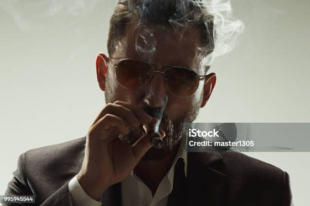 The Barded Man In A Suit Holding Cigar Stock Photo - Download Image Now - Manager, Mafia, Men