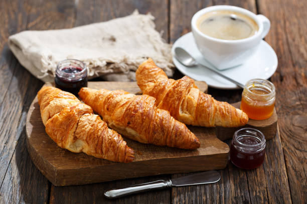 istock breakfast with croissants and cup of coffee 995953246