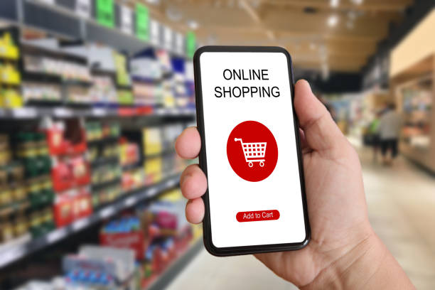 istock E-commerce internet shopping cart mobile phone app supermarket 995959496