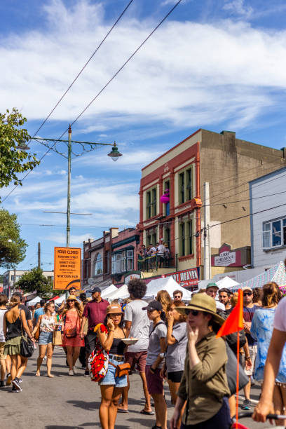 Happy crowds peruse the stalls at the lively Newtown Festival. Wellington, New Zealand - March 04, 2018: Happy crowds peruse the stalls at the lively Newtown Festival. newtown stock pictures, royalty-free photos & images