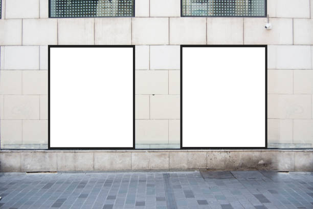 istock Poster mockup at white rock wall on street 995963502