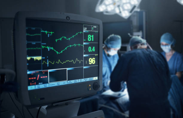 Keeping a close monitor on the patient's state of health Shot of a hospital monitor in an operating theatre monitoring equipment stock pictures, royalty-free photos & images