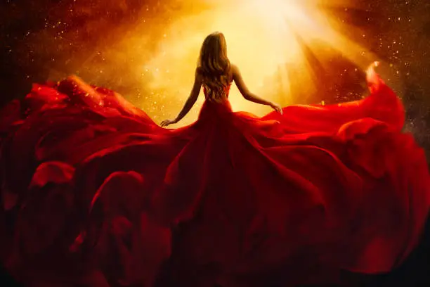Fashion Model Back Side in Red Flying Dress, Woman Rear View, Gown Fabric Fly on Wind, Beautiful Girl Looking to Light