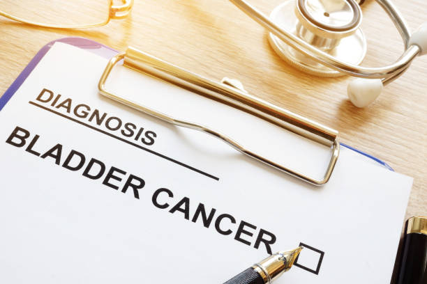 istock Diagnosis bladder cancer and pen on a desk. 995968332