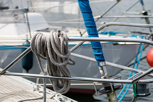 Rigging of deep-sea sailboats. Sailing accessories on a yacht. Season of the summer.
