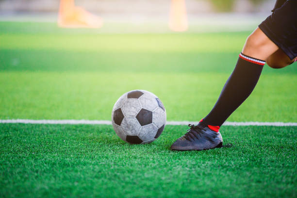 istock The soccer player shoot ball 995981740