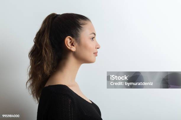 Young Woman Side View Stock Photo - Download Image Now - Profile View, Women, Side View