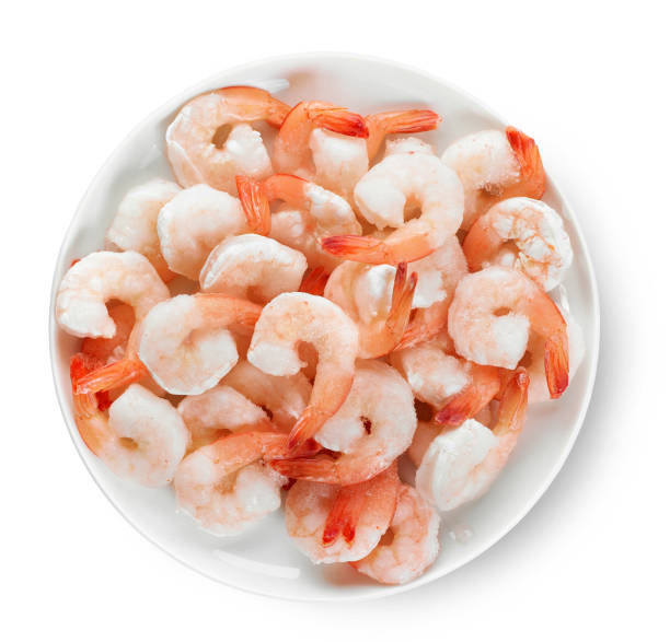 istock plate of frozen prawns 995987842