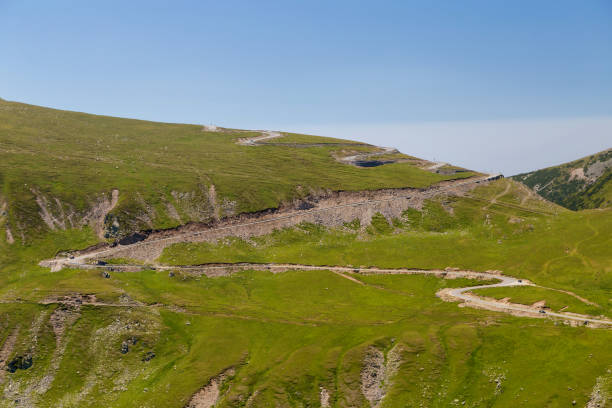 istock Summer view of Transalpina mountain road 995996100