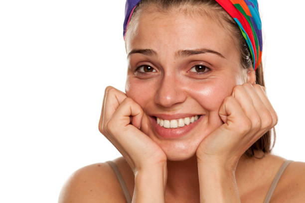 istock Beautiful young smiling woman without makeup on white background 996001610