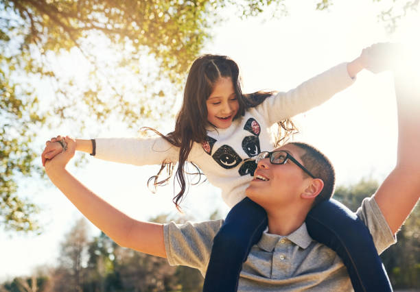 istock I'm taller than you big brother 996010570