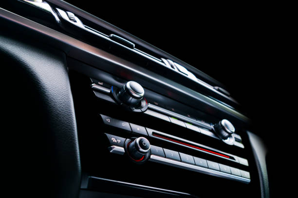 istock Car inside. Interior of a car. Comfortable leather Black seats. Black perforated leather. Car interior details. Car detailing 996022678