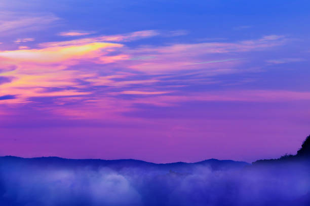 nature background of cloud and twilight sky over the mountain.