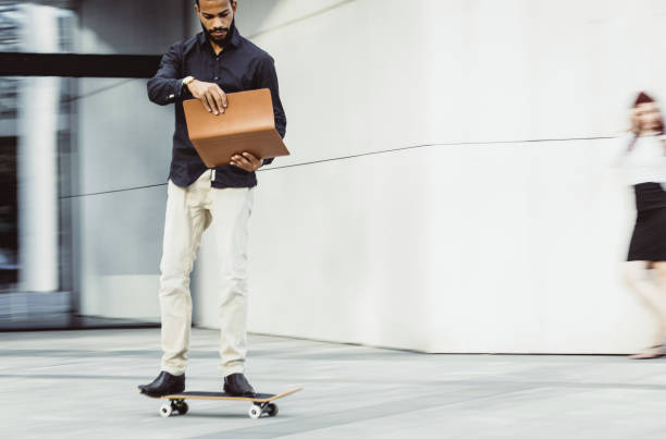 istock Businessman on a Skateboard, Blurred motion 996026258