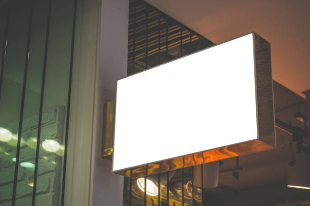 istock Horizontal rectangular white empty signage mock up of store, shop in shopping mall 996028438