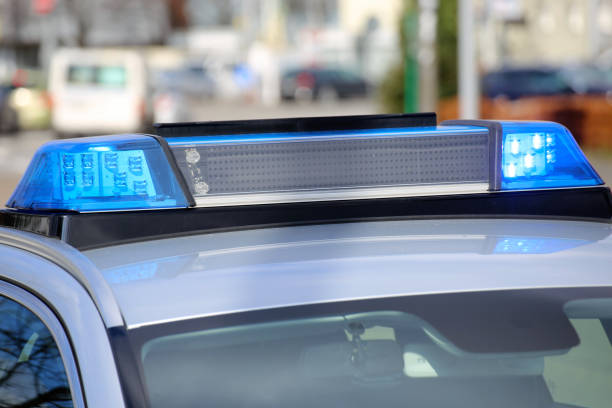 istock Blue light on a police car 996035054