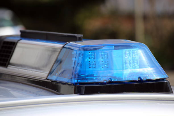 istock Blue light on a police car 996039314