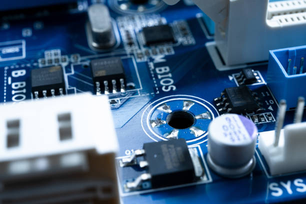 istock Electronic circuits in futuristic technology concept. Motherboard computer on blue background. Microchip digital data 996051314