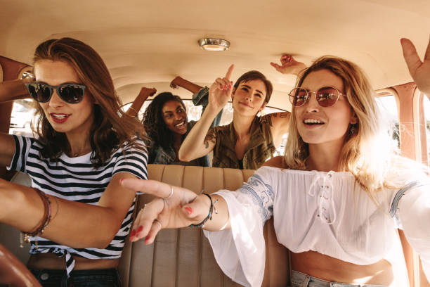 Girls singing and dancing on rod trip