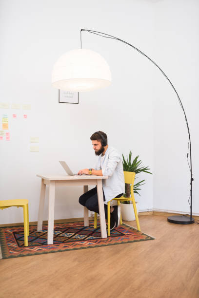 istock Caucasian man working at the office 996083074
