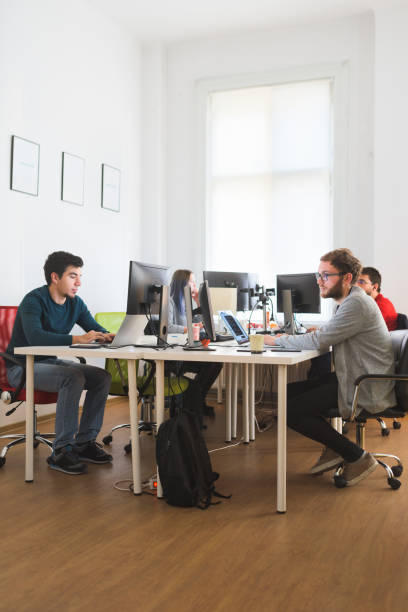 istock People in coworking office 996083504