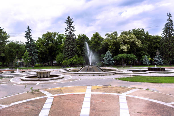 istock Big park in spa resort with fountain and walking path 996089580