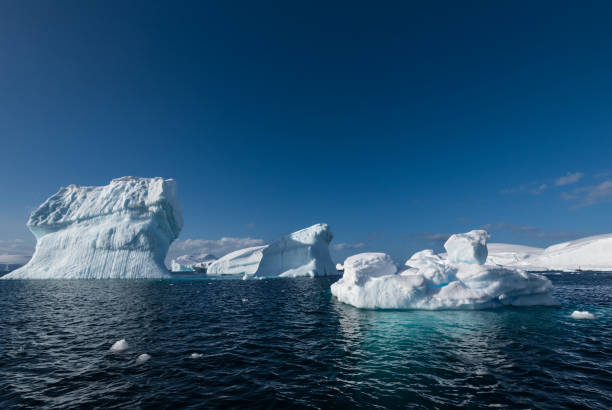 istock Weather eroded icebergs in Wilhemina Bay Antarctica 996102028