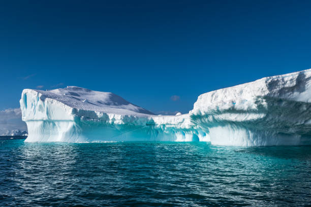 istock Weather eroded iceberg in Wilhemina Bay Antarctica 996104132