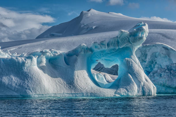 istock Weather eroded iceberg in Wilhemina Bay Antarctica 996104470