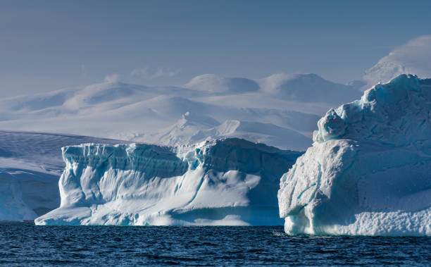 istock Weather eroded iceberg in Wilhemina Bay Antarctica 996104580