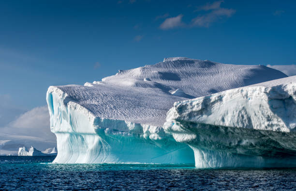 istock Weather eroded iceberg in Wilhemina Bay Antarctica 996104760